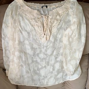 Sheer cream top with gold accent slightly